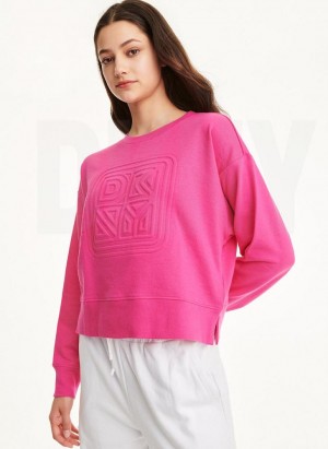 Pink DKNY Embossed Logo Crewneck Women's Sweatshirts | USA-D0112