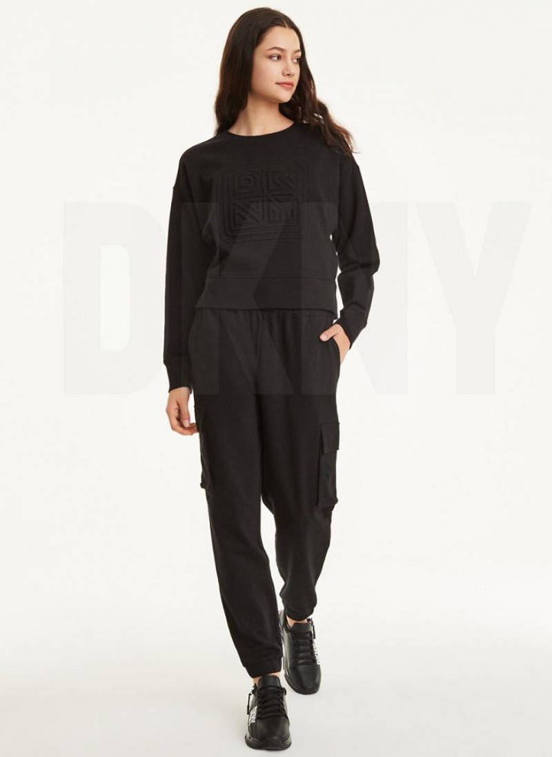 Black DKNY Embossed Logo Crewneck Women's Sweatshirts | USA-D1223