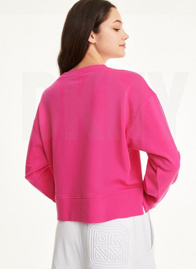 Pink DKNY Embossed Logo Crewneck Women's Sweatshirts | USA-D0112