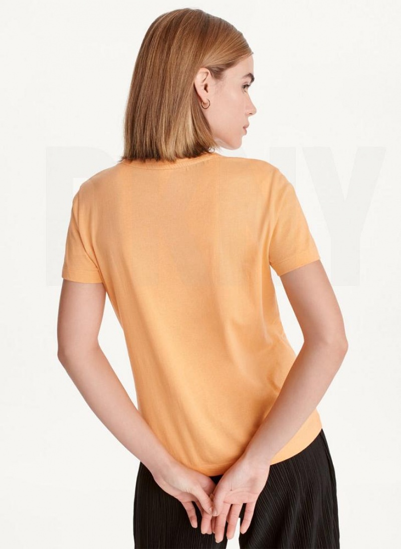 Yellow DKNY Short Sleeve Embossed Logo Women's T Shirts | USA-D1612